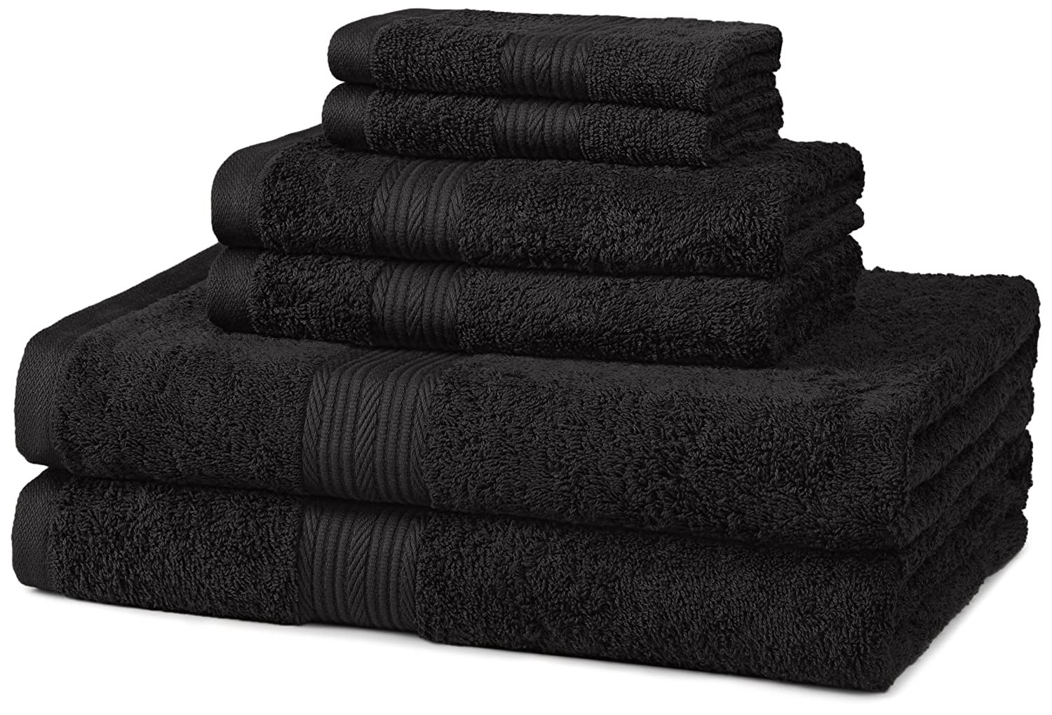 Six black towels of different sizes folded on top of each other