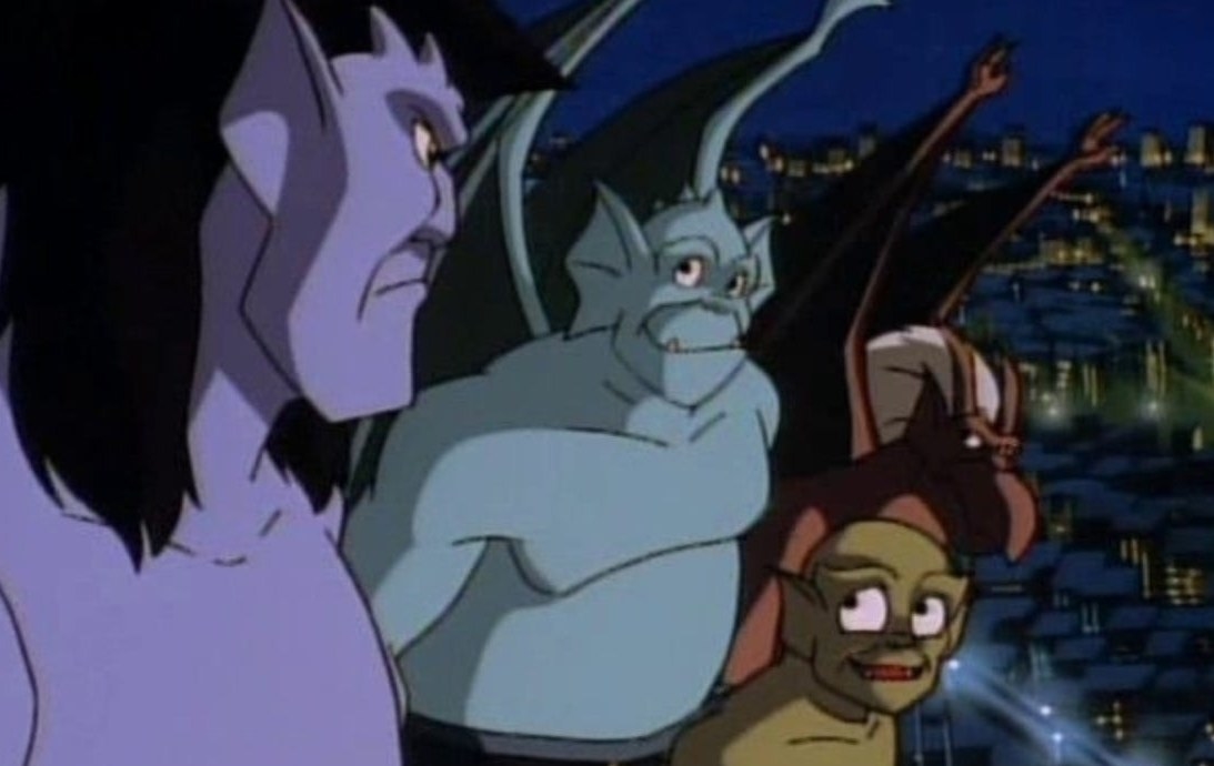 The Gargoyles look at each other with a city in the background