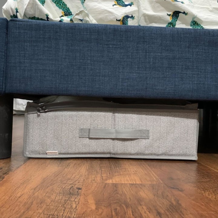 reviewer photo showing the underbed storage under their bed