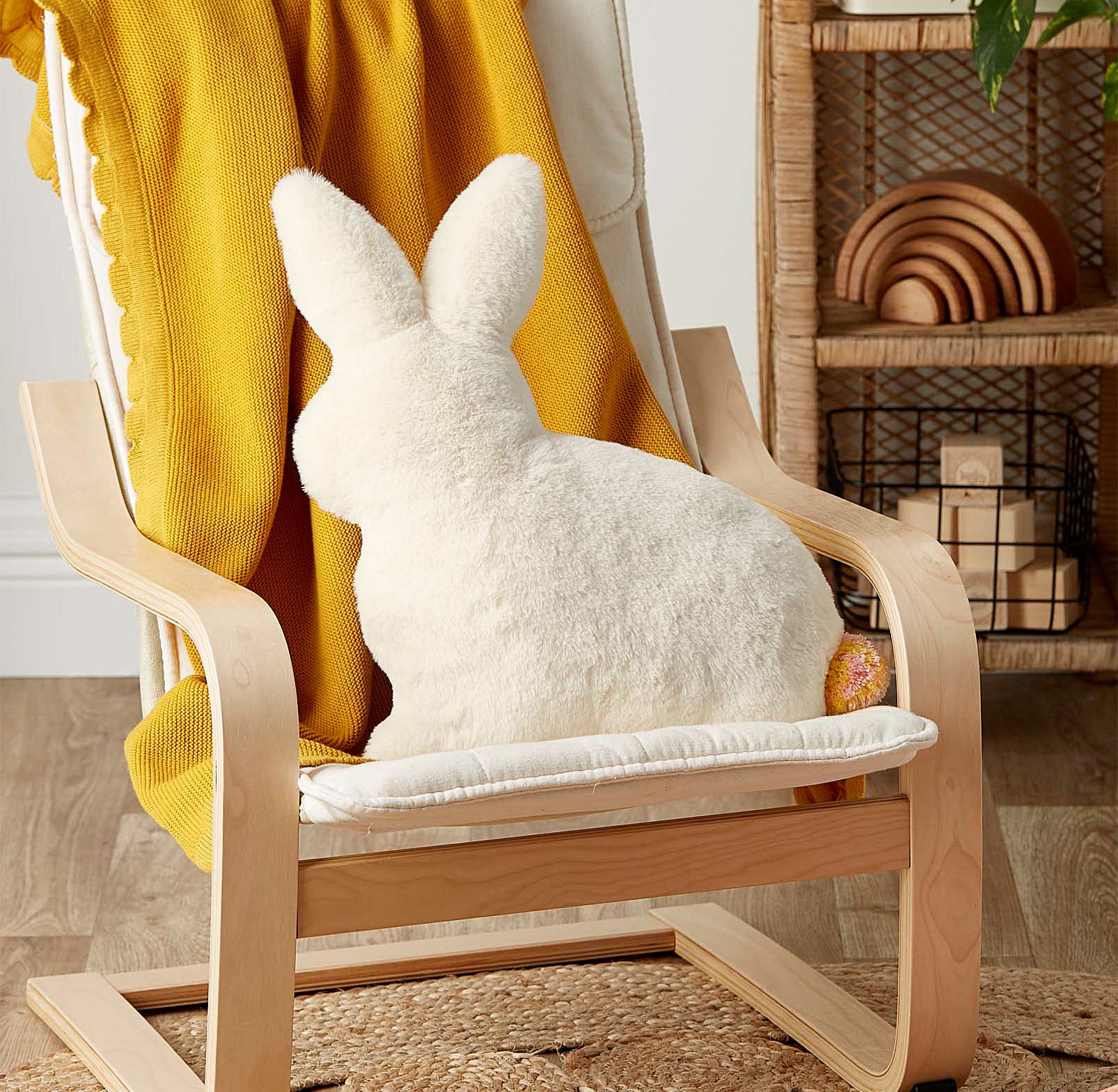 The rabbit pillow on a chair