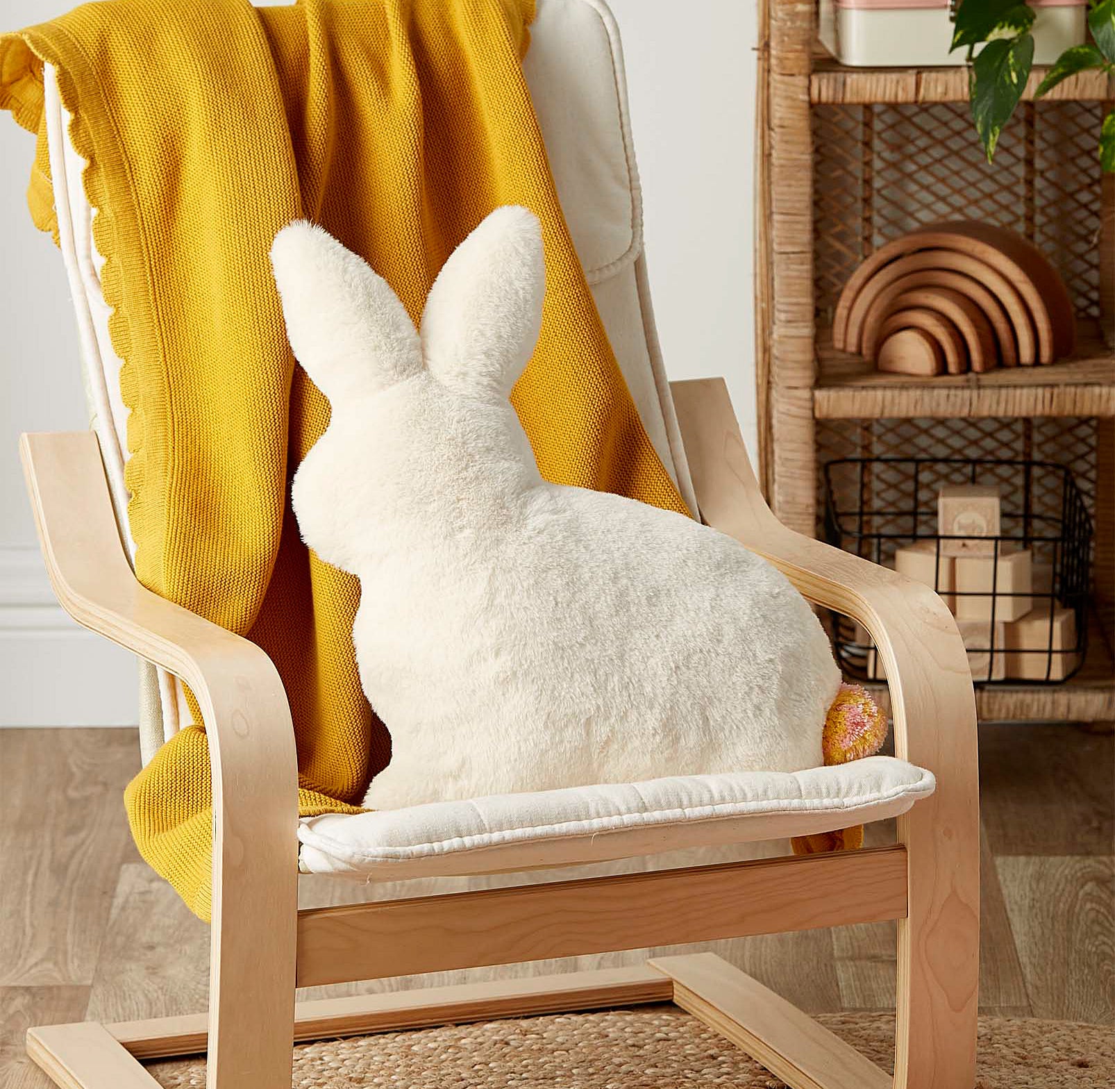 The rabbit pillow on a chair