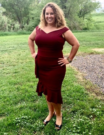 Reviewer wearing the dress in red