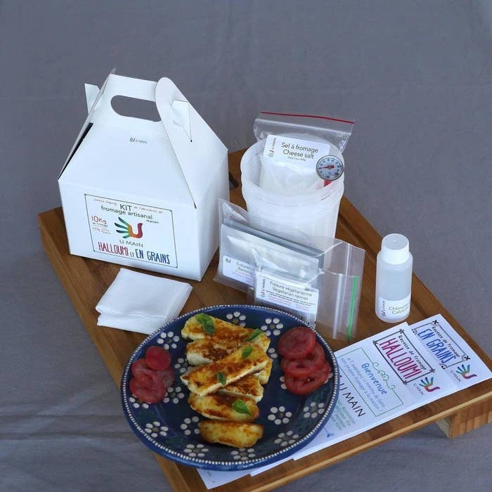 The cheese-making kit on a wooden server