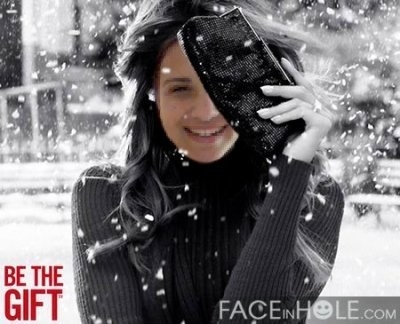 a girl with her face replacing that of a woman in a black and white image in the snow