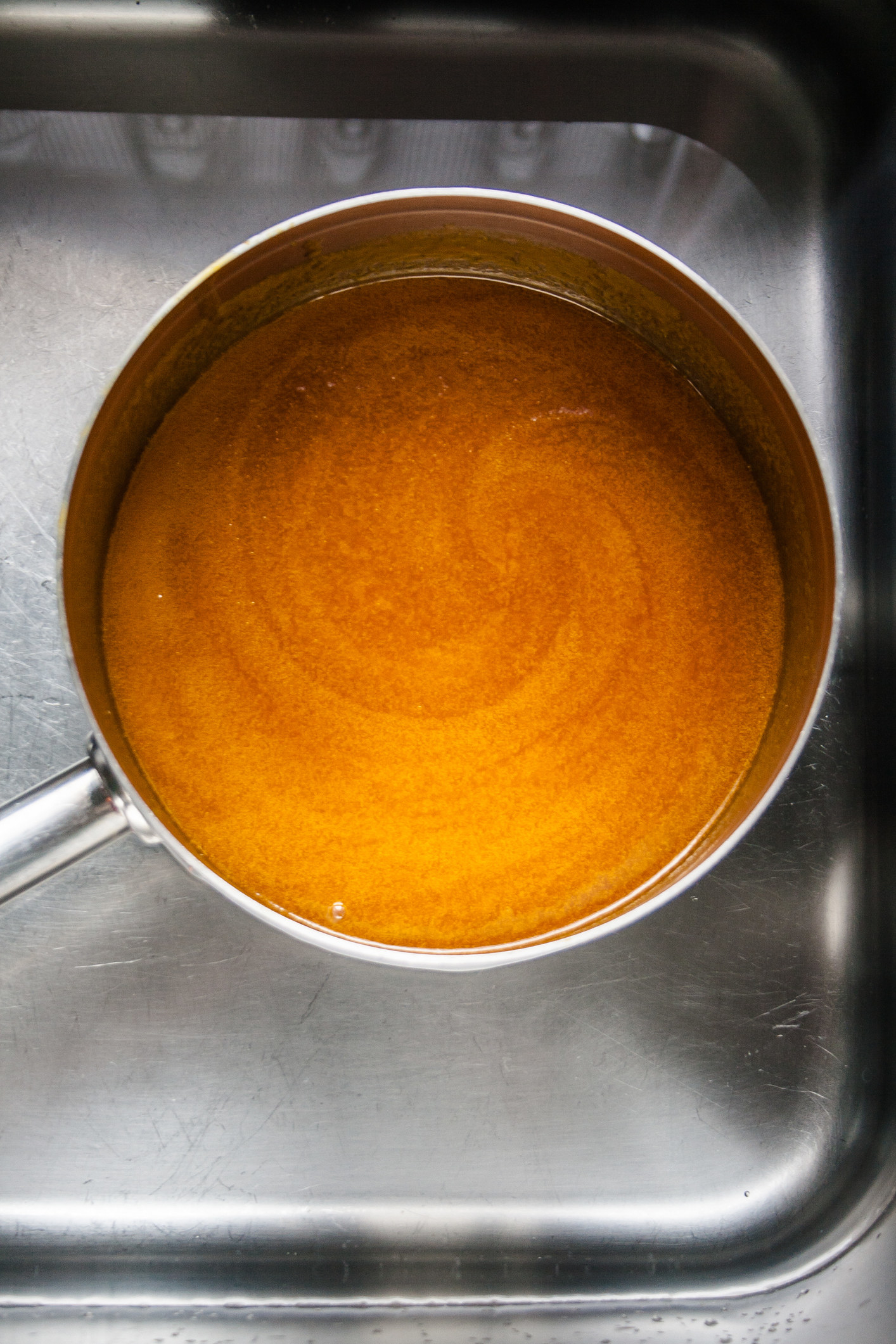 A pot of gravy.