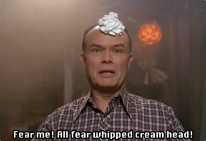 Red, with whipped cream on his head, saying &quot;Fear me! All fear whipped cream head!&quot;