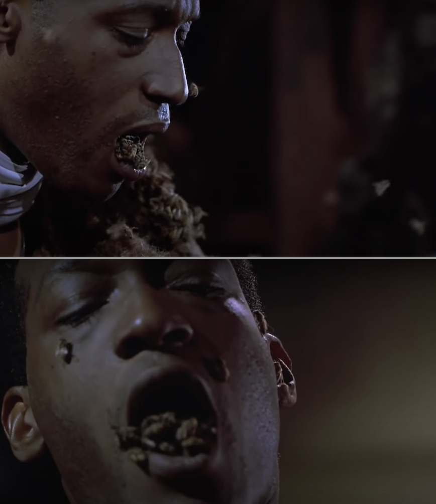 Tony Todd with bees all over his mouth and face