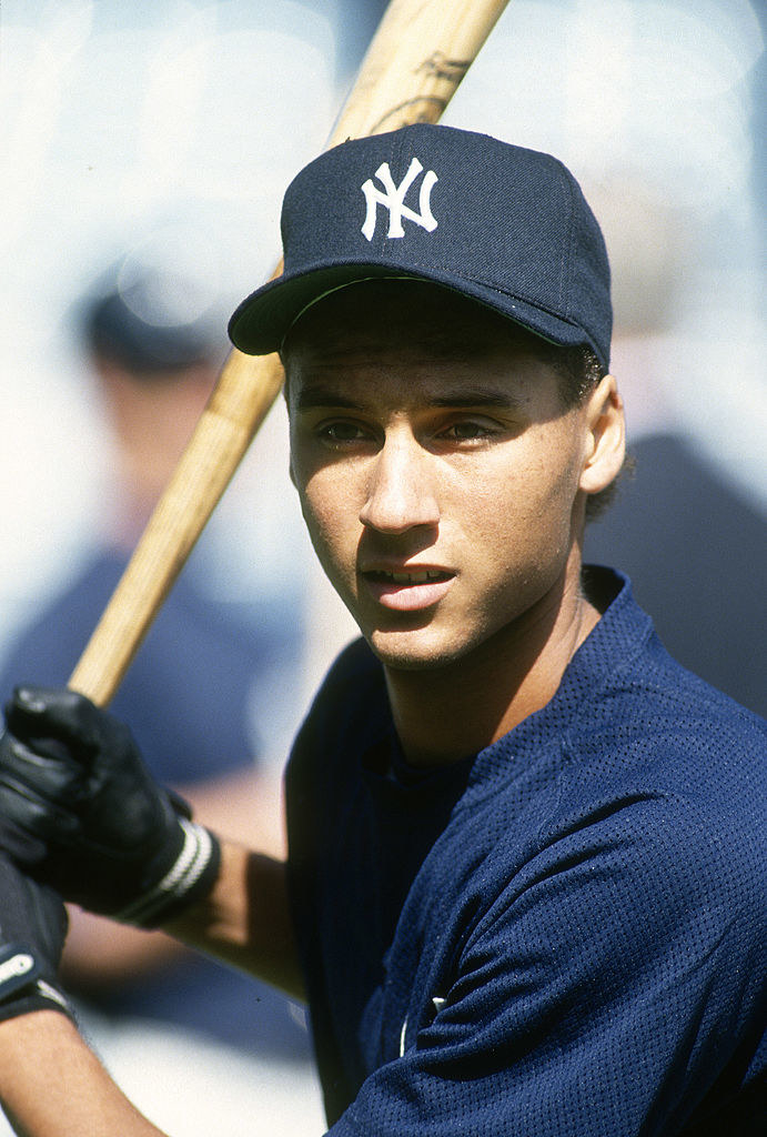 Derek Jeter posing for a portrait with a bat as a new member of the Yankees minor league team in 1992