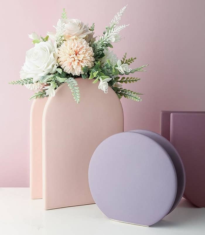 Two of the geometric vases in light purple and pink