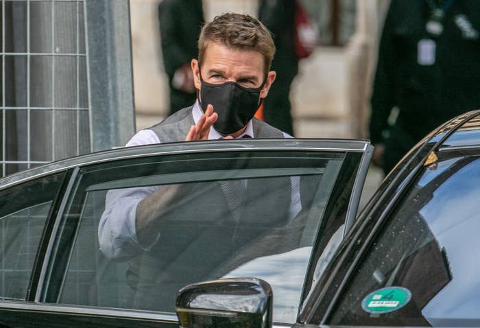 Tom Cruise entering a vehicle on the set of Mission: Impossible 7