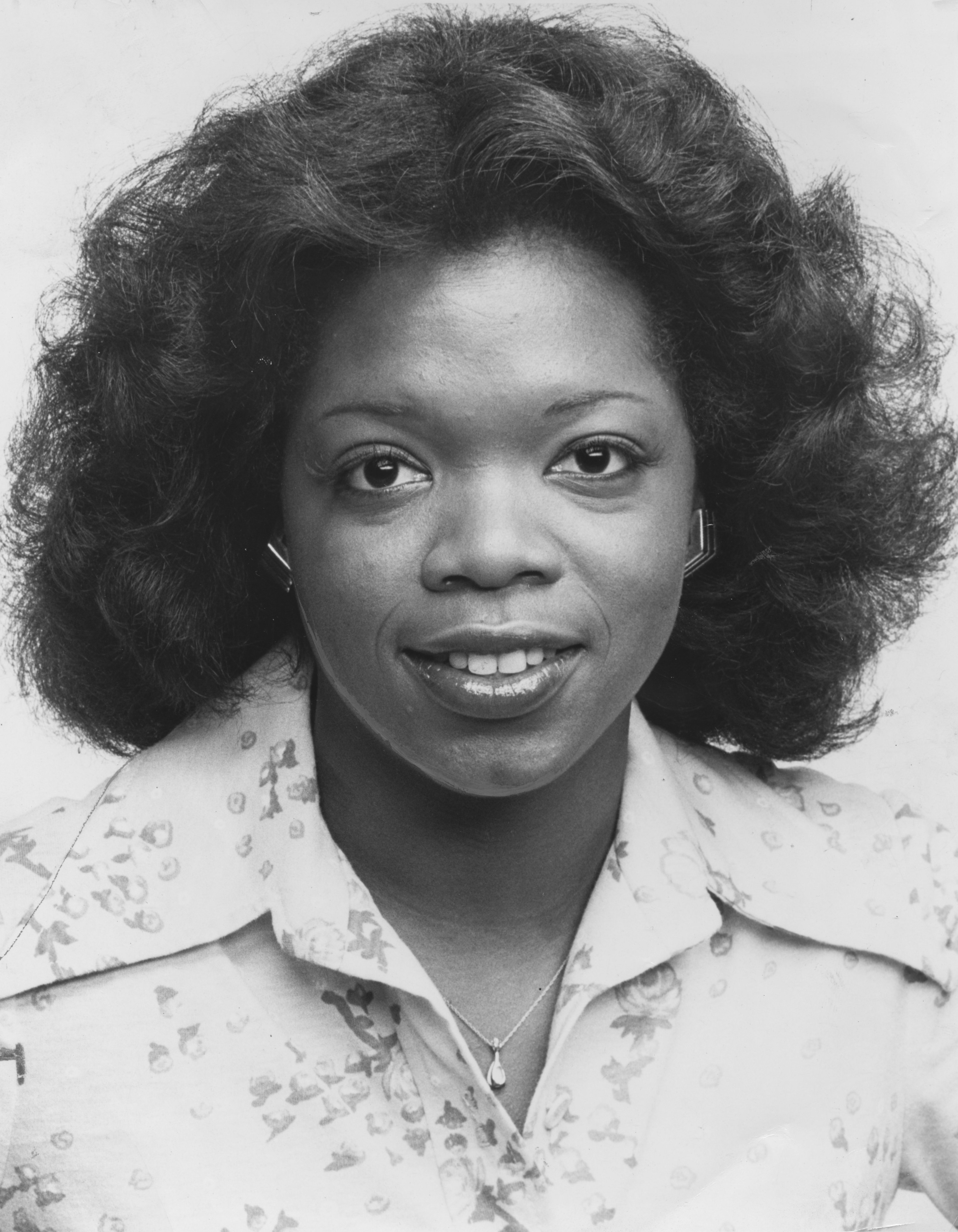 Black and white headshot of Oprah