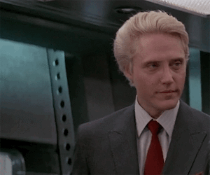 A young Christopher Walken in a suit
