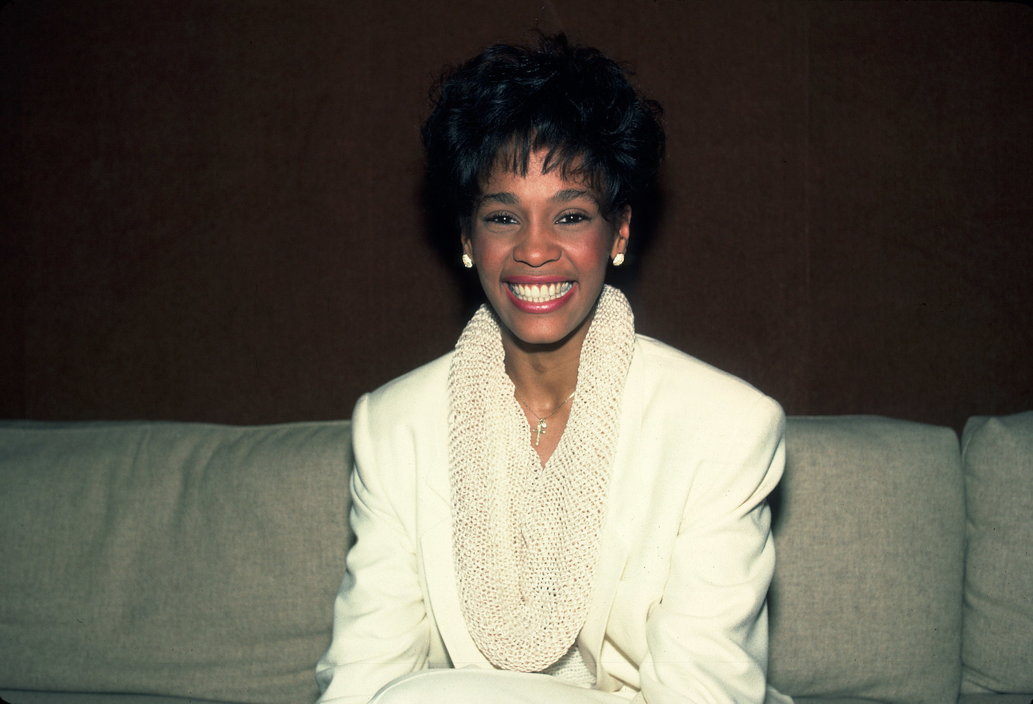 Whitney Houston smiles while at the Chicago Recording Company on Feb. 20, 1985