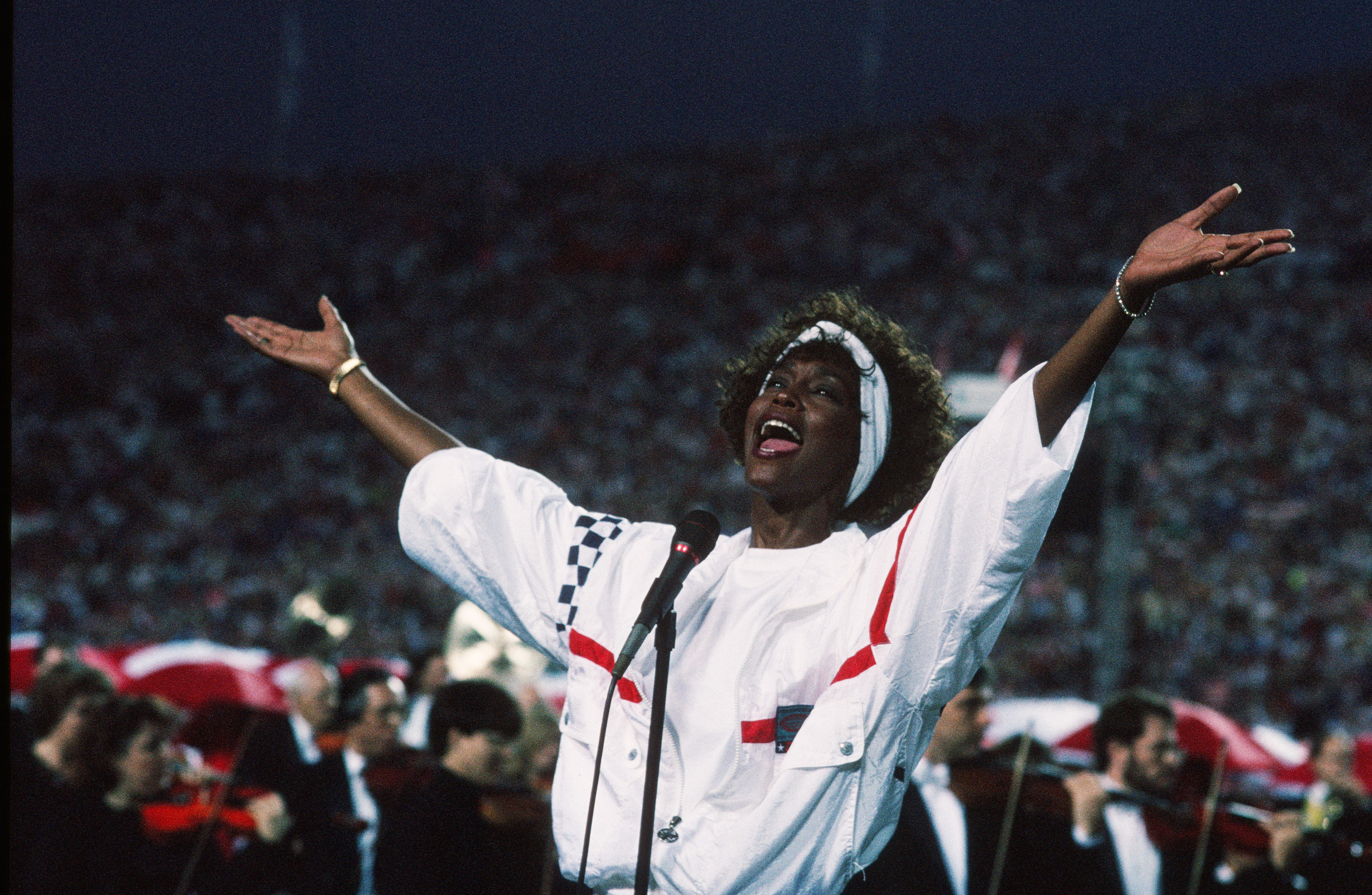 Singer and actor Whitney Houston sings the National Anthem at the 1991 Tampa, Florida, Superbowl XXV