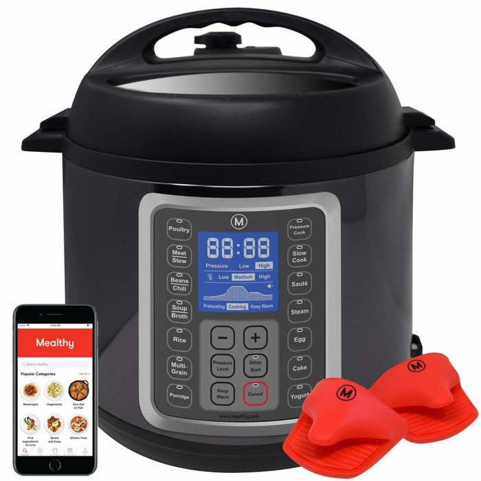 Instant pot with a phone showing the recipes