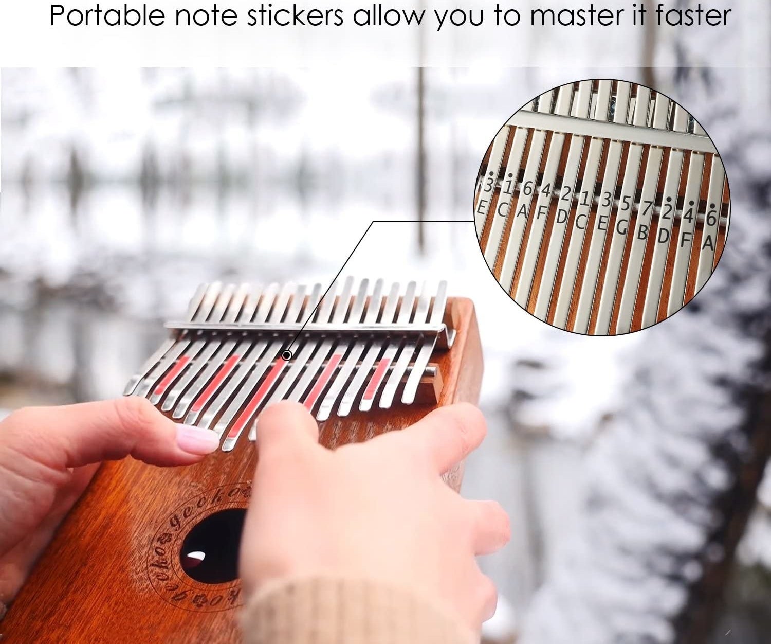 person playing the kalimba