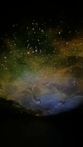 A projection of the Eagle Nebula onto a ceiling