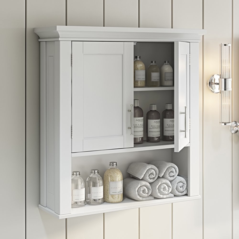 a white bathroom cabinet with two doors and one shelf hung on a wall