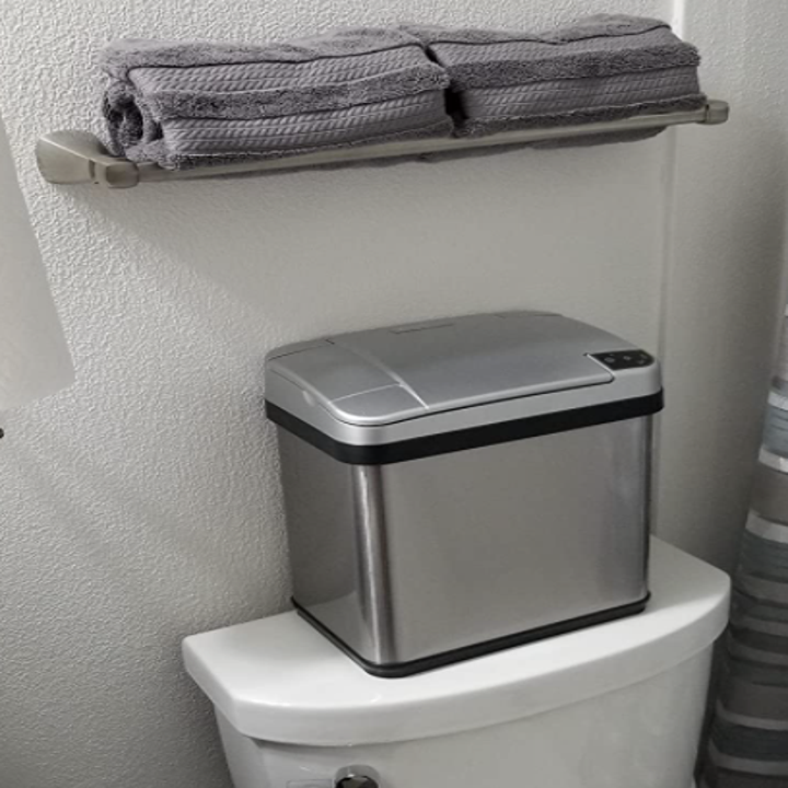 Reviewer bin on top of toilet