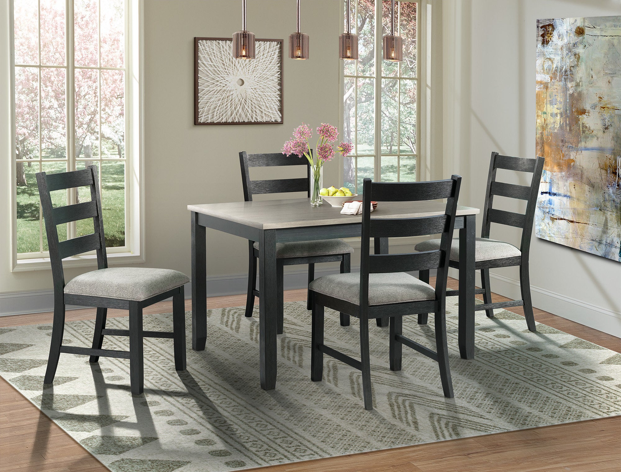 black dining set with padded chairs and a table