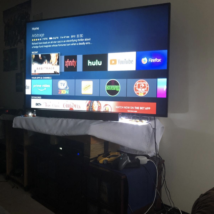 tv screen showing various apps when fire stick is plugged in
