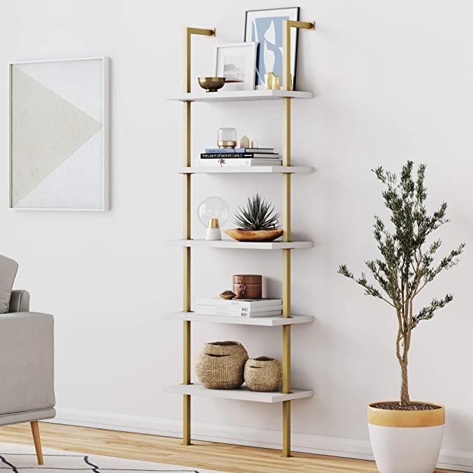 The bookshelf in gold and white