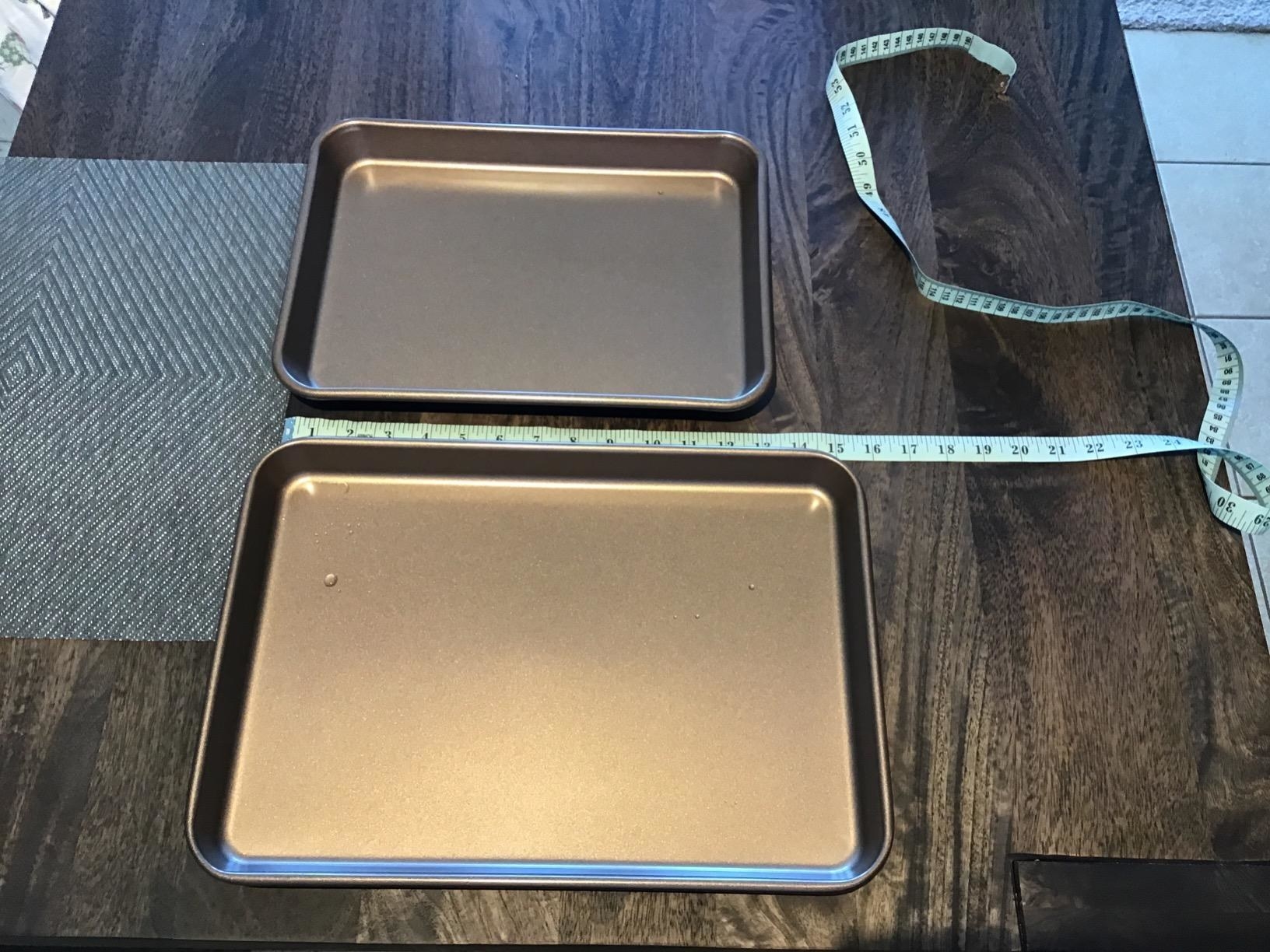 reviewer image of two NutriChef nonstick baking sheets