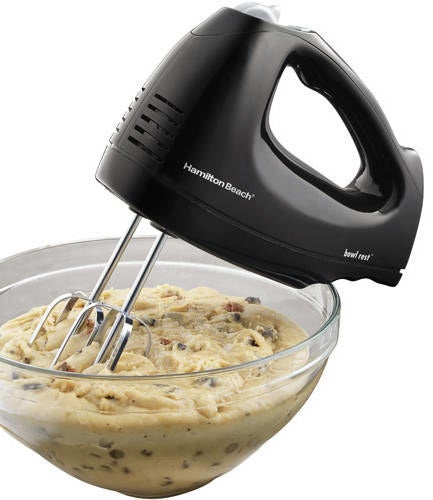 black hamilton beach hand mixer making a dough batter