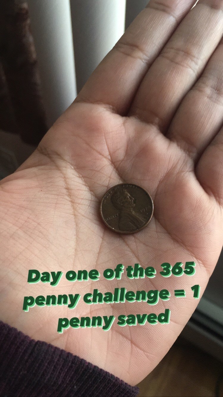 Me holding a penny and saying &quot;Day one of the 365 penny challenge = 1 penny saved&quot;