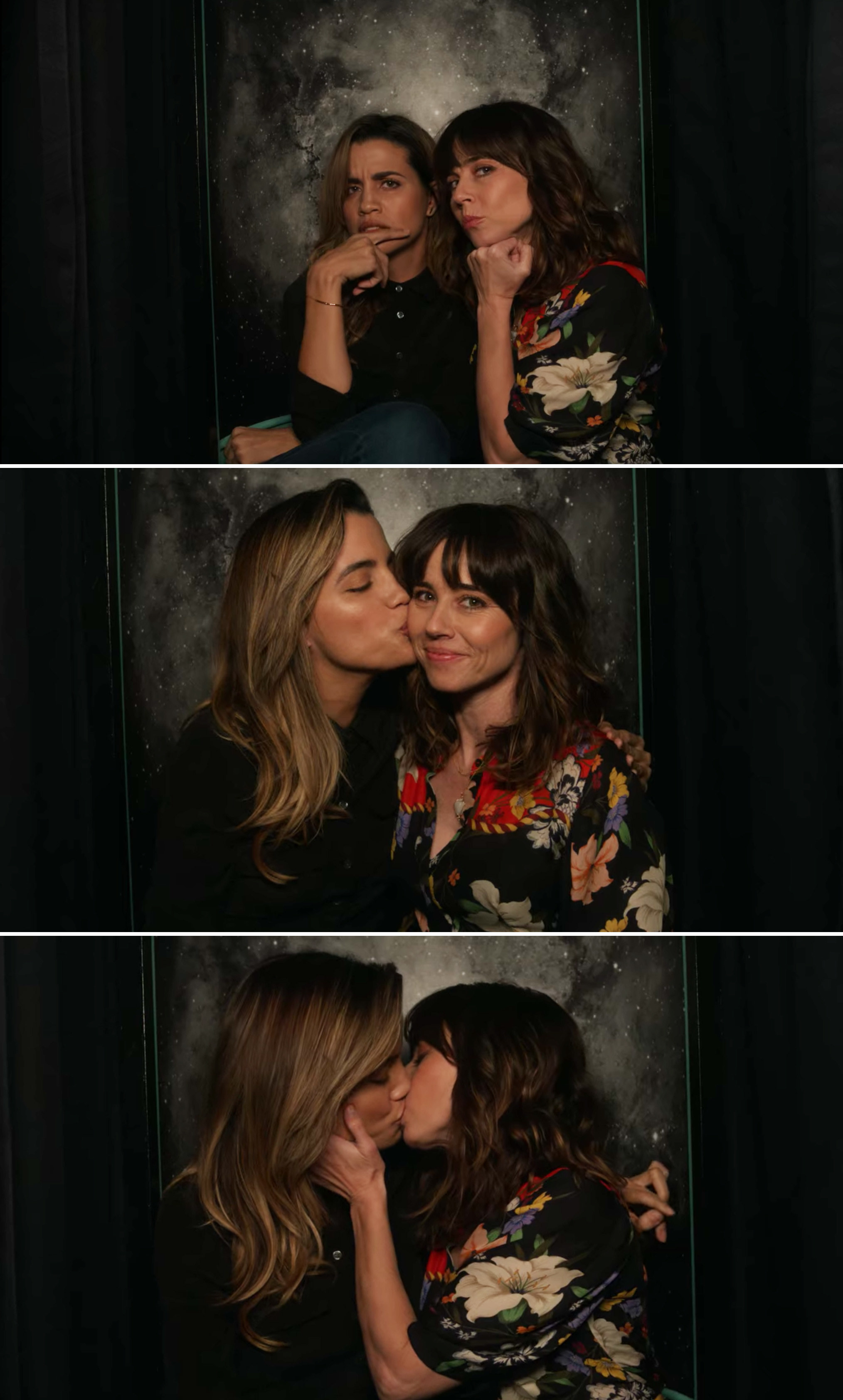 Judy and Michelle posing in a photo booth then kissing