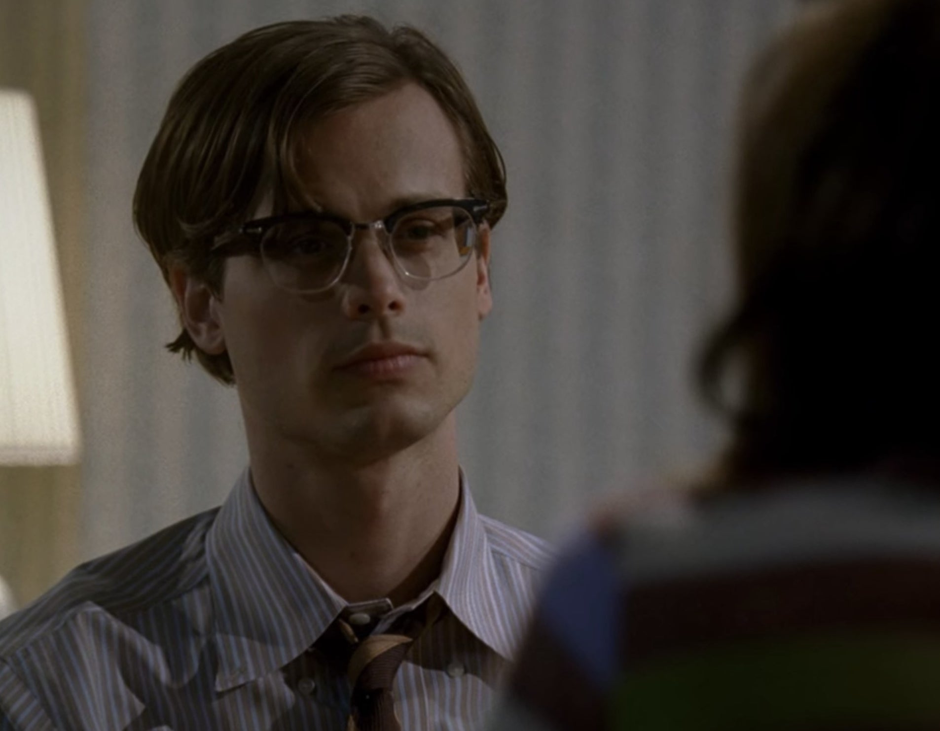 Spencer Reid from Criminal Minds talking to a person
