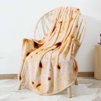 tortilla blanket hanging over chair