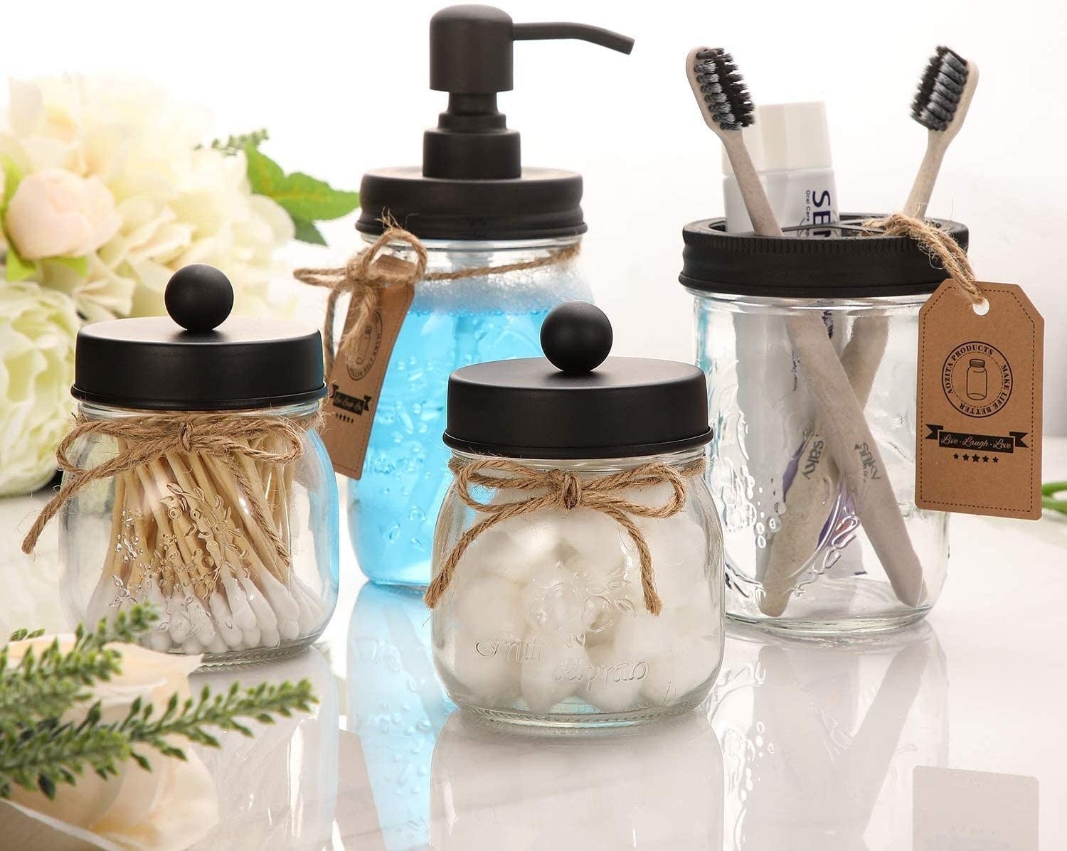 Four mason jars in use on counter