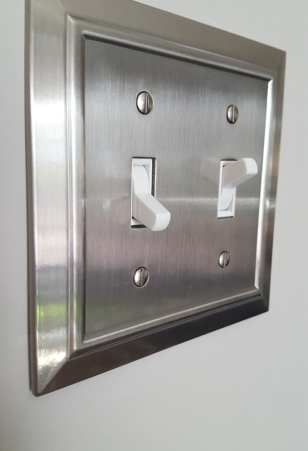 The silver-plated light switch cover
