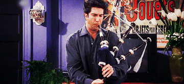 A gif of Ross Gellar from friends playing the bagpipes. 