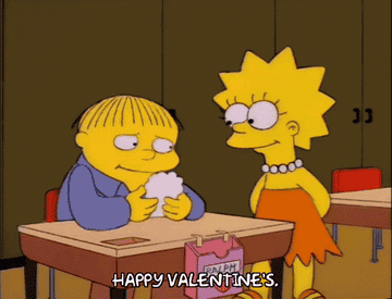 GIF of Lisa Simpson giving Ralph Wiggum a Valentine&#x27;s Card