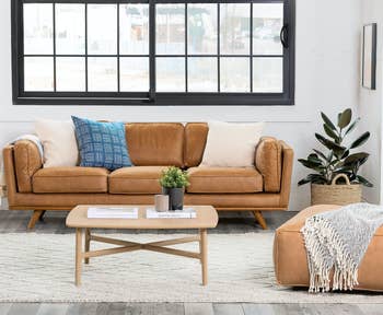 The mid-century modern couch in tan