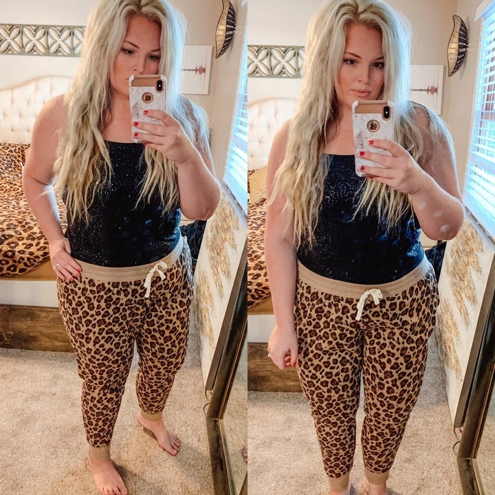 Reviewer wearing brown leopard joggers
