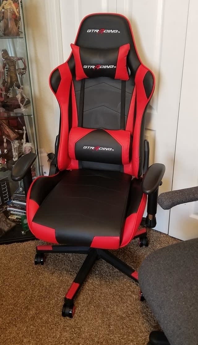Reviewer black and red chair in room