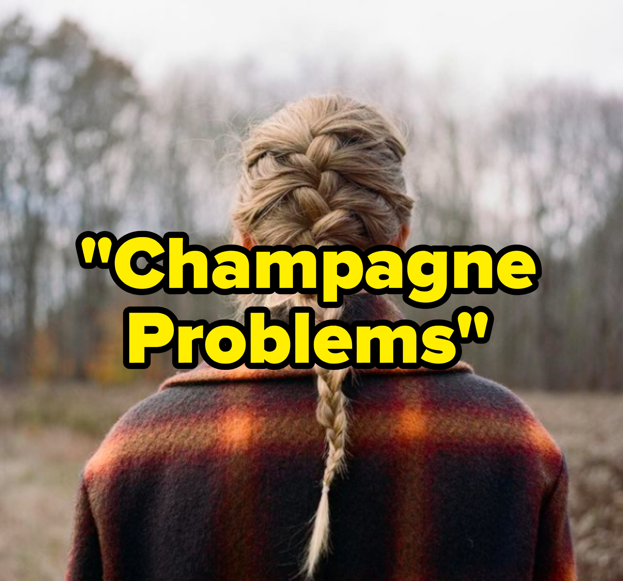 "Champagne Problems" written over the "Evermore" album cover