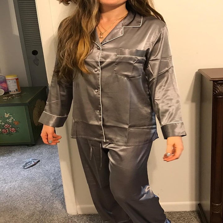 Reviewer wearing gray pajama set