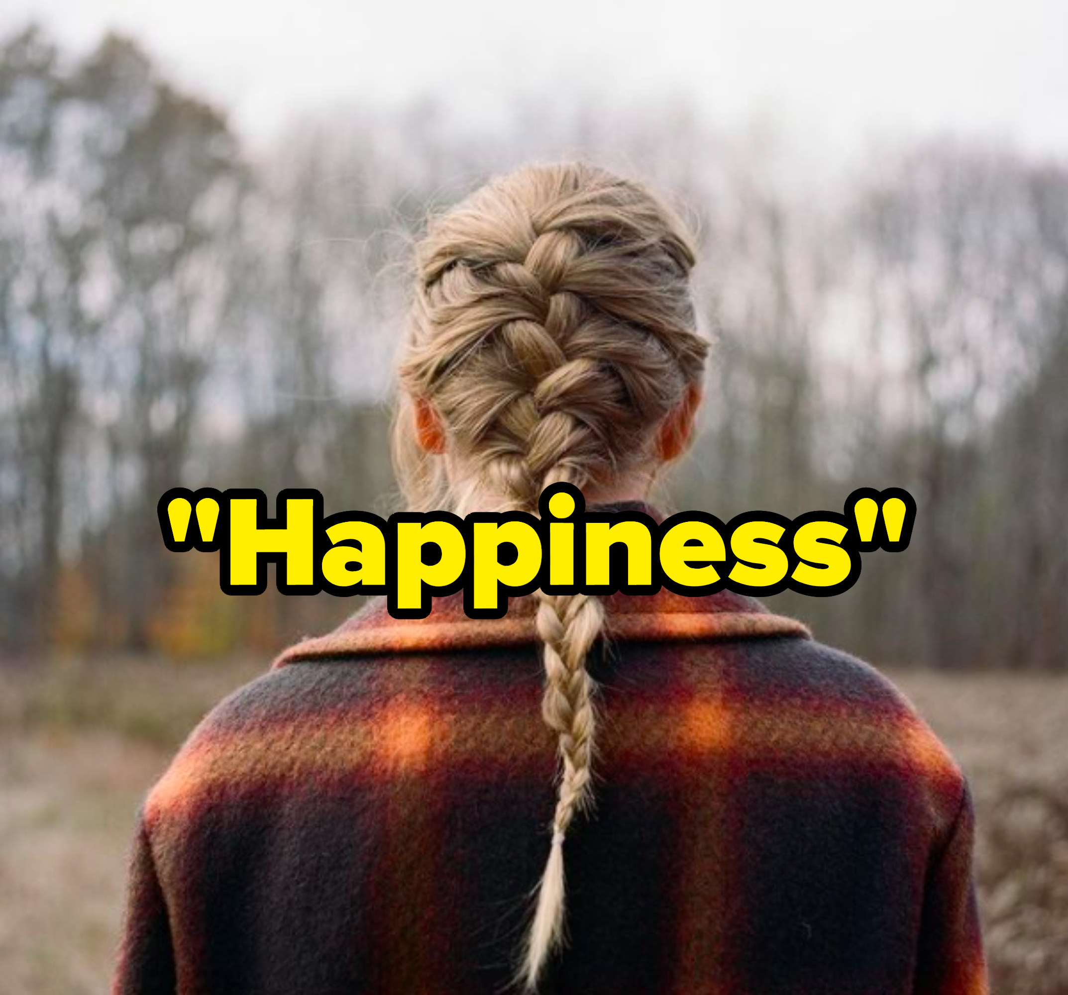 &quot;Happiness&quot; written over the &quot;Evermore&quot; album cover