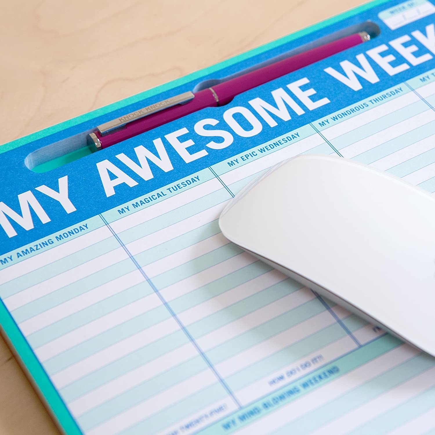 "my awesome week" notepad used as a mousepad