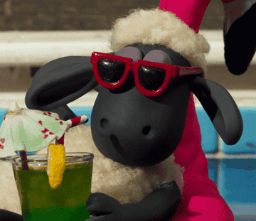 Shaun the Sheep lifts his sunglasses up and peeks out with one eye while drifting on a pool floatie, drinking a cocktail in Shaun the Sheep