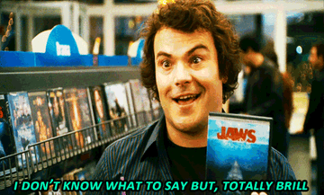 Jack Black/Miles holds up &quot;Jaws&quot; in the Blockbuster and says &quot;I don&#x27;t know what to say but, totally brill&quot;