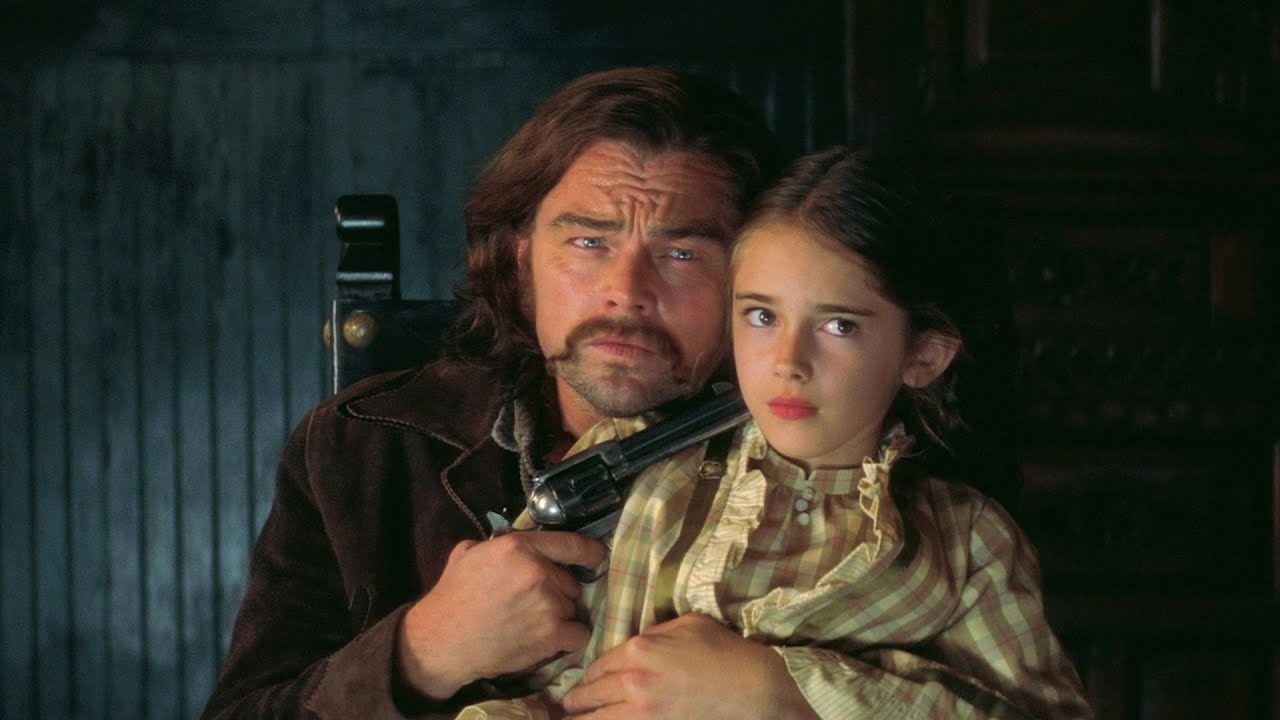 Rick Dalton holding up a gun to Trudi&#x27;s head on the set of a Western film