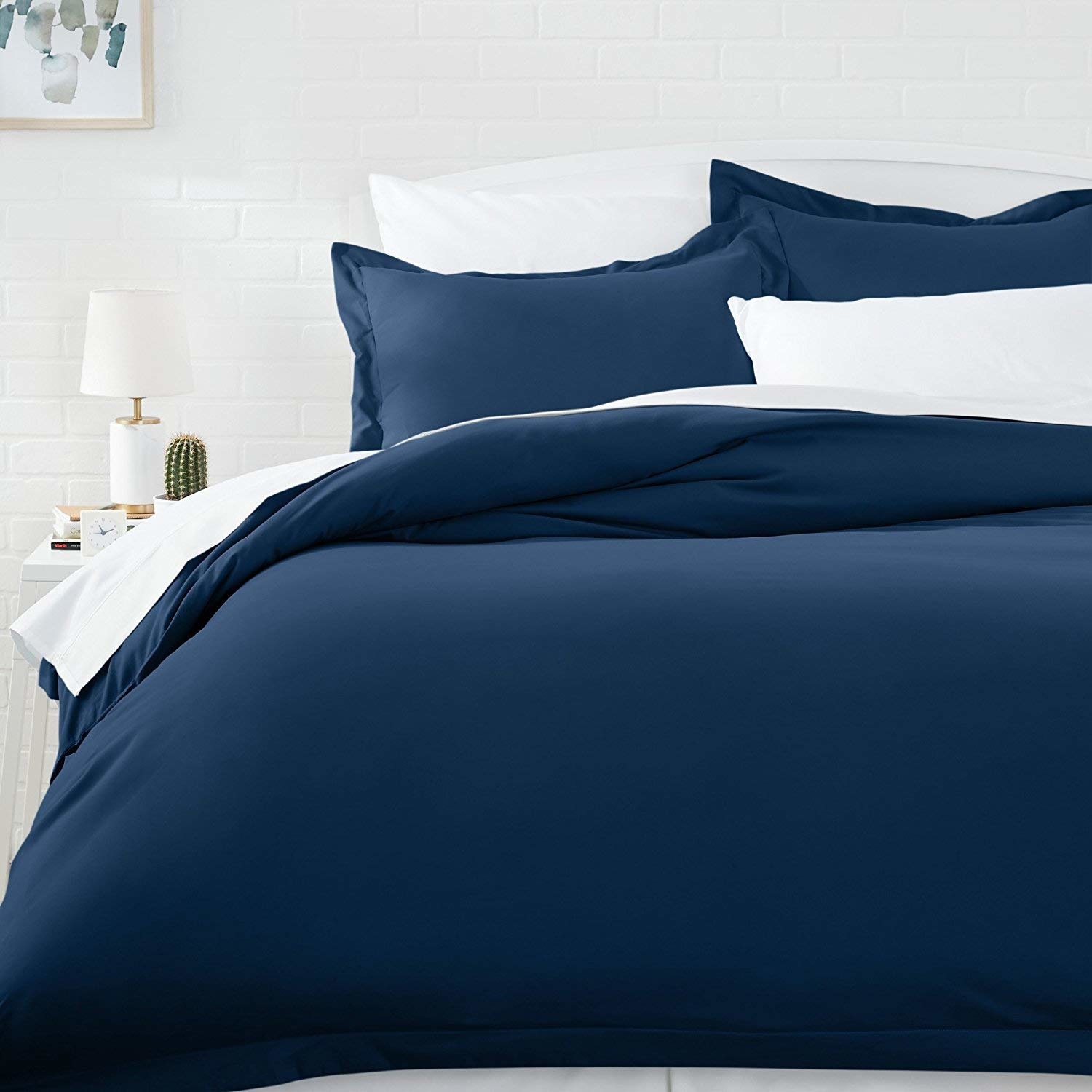 A blue microfiber duvet cover on a bed