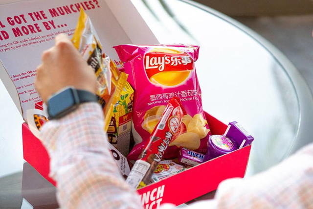 the munch addict box full of snacks from around the globe