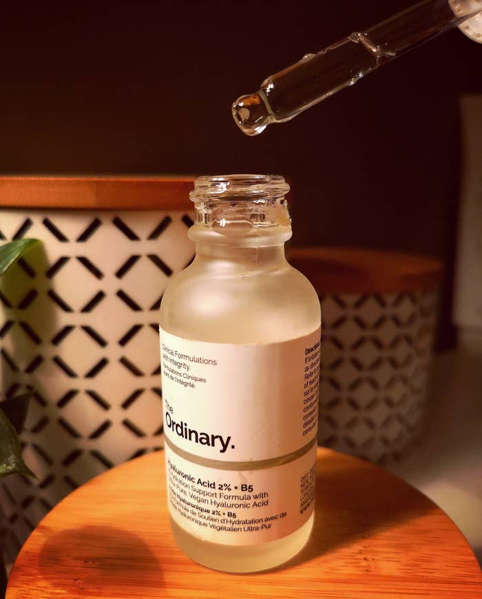 A bottle of hyaluronic acid with its dropper 