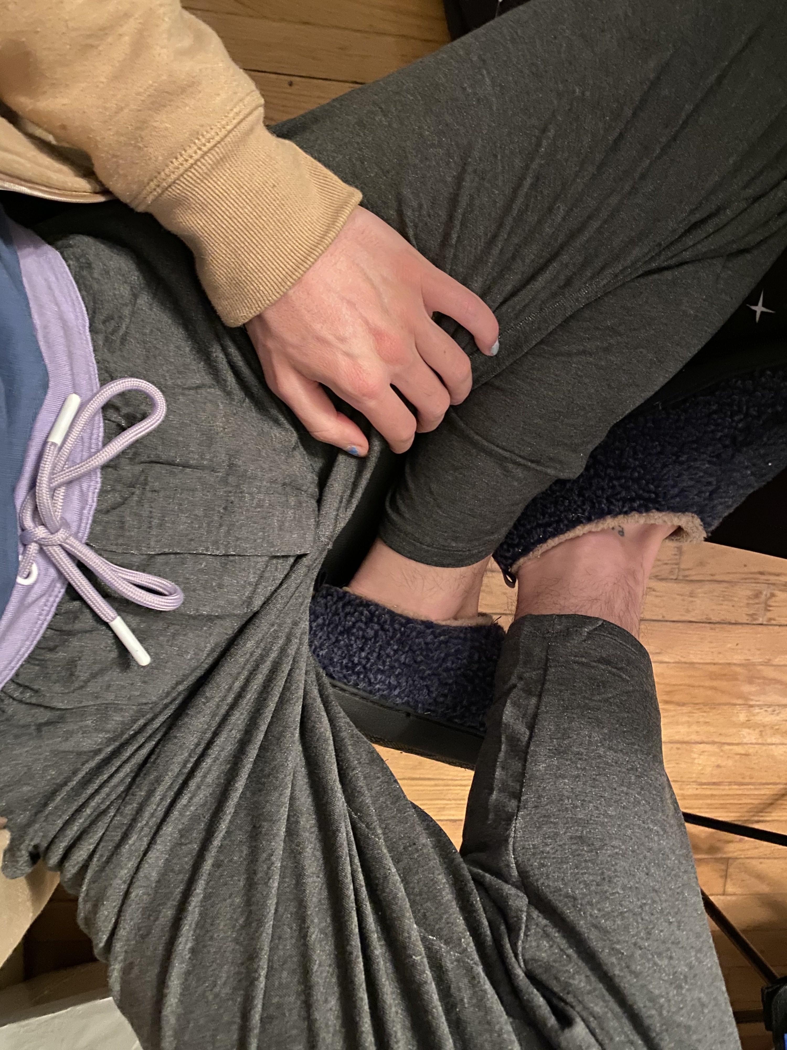 the author wearing the gray pants with a lavender waistband and drawstring